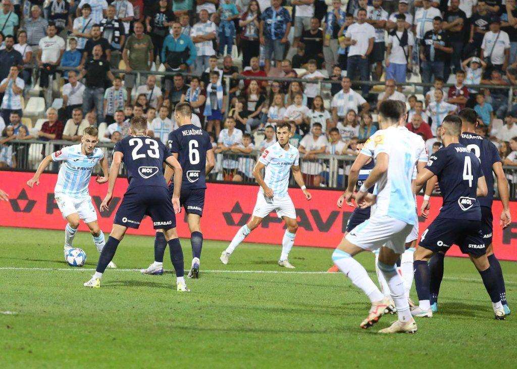 DOMINACIJA MODRIH I BIJELIH: Dinamo osvojio nova tri boda, Rijeka s dva pogotka Marka Pjace savladala Osijek DOMINACIJA MODRIH I BIJELIH: Dinamo osvojio nova tri boda, Rijeka s dva pogotka Marka Pjace savladala Osijek