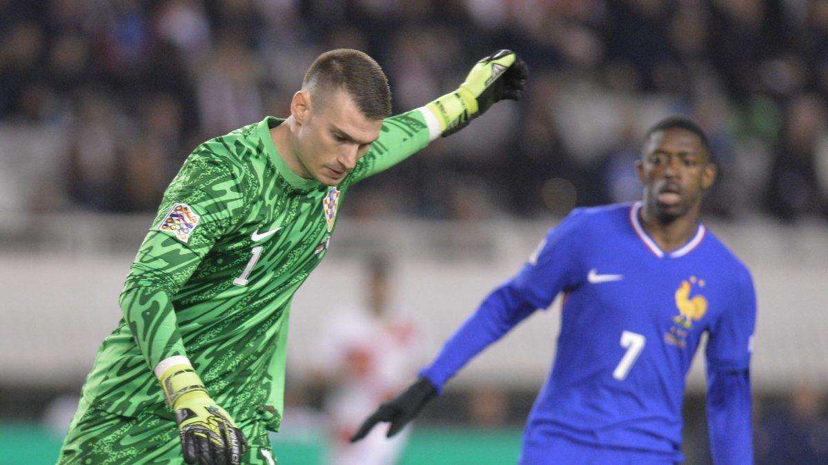 PORAZ "VATRENIH" OD FRANCUSKE: Nakon dramatičnih jedanaesteraca Hrvatska ispala iz natjecanja Lige nacija Dominik Livaković i i Ousmane Dembele / Foto: Hina