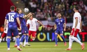 LUDA UTAKMICA U VARŠAVI: Hrvatska s 10 igrača osvojila bod, Livakoviću sporni crveni karton Luka Modrić u utakmici Poljska - Hrvatska / Foto: Hina