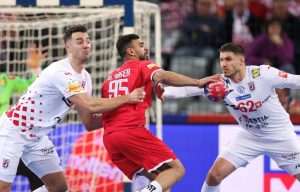BRILJANTNA IGRA: Hrvatska rukometna reprezentacija pobjedom nad Bahrainom od 36-22 otvorila SP Zvonimir Srna, Mohamed Mohamed i Marin Jelinić / Foto: Hina