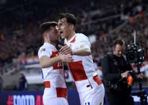 IZJAVE IGRAČA: Modrić prezadovoljan rezultatom i poziva na oprez, Budimir očekuje sasvim drugu utakmicu u Parizu, Livaković zahvalio gledateljima na sjajnoj atmosferi Martin Baturina i Ante Budimir slave pogodak protiv Francuske / Foto: Hina